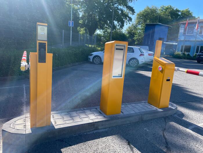 Barriers for the ticketless parking system at the entrance to the Dina-Hitex complex in Bučovice